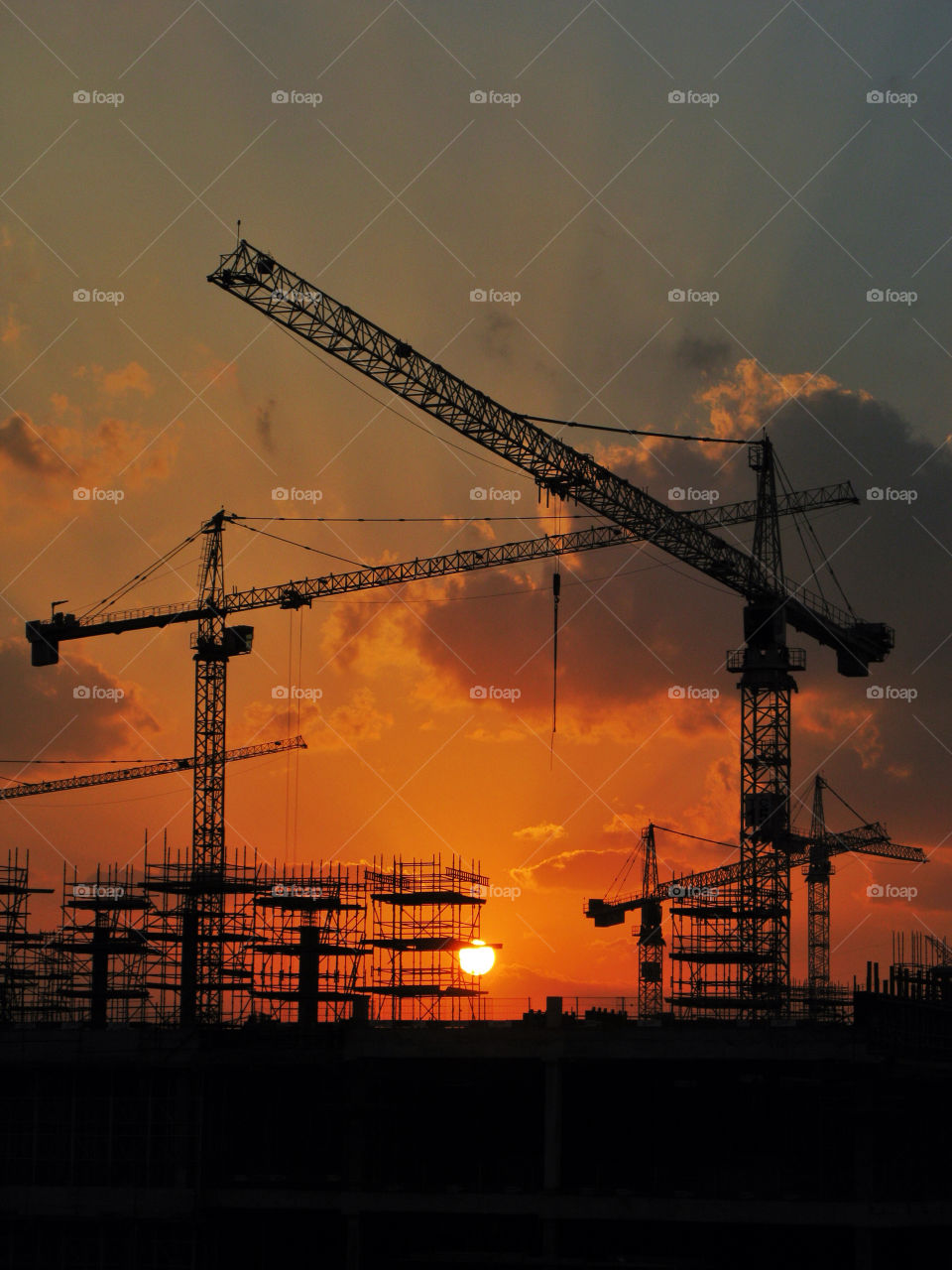 construction sunset building silhouette by chrisc