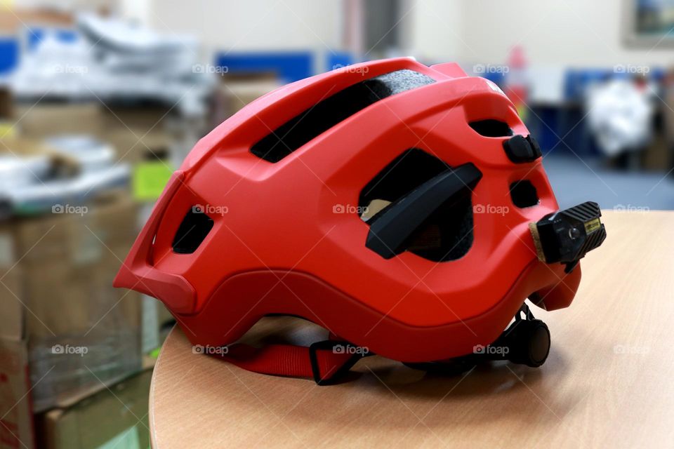 Photo of a red bicycle helmet