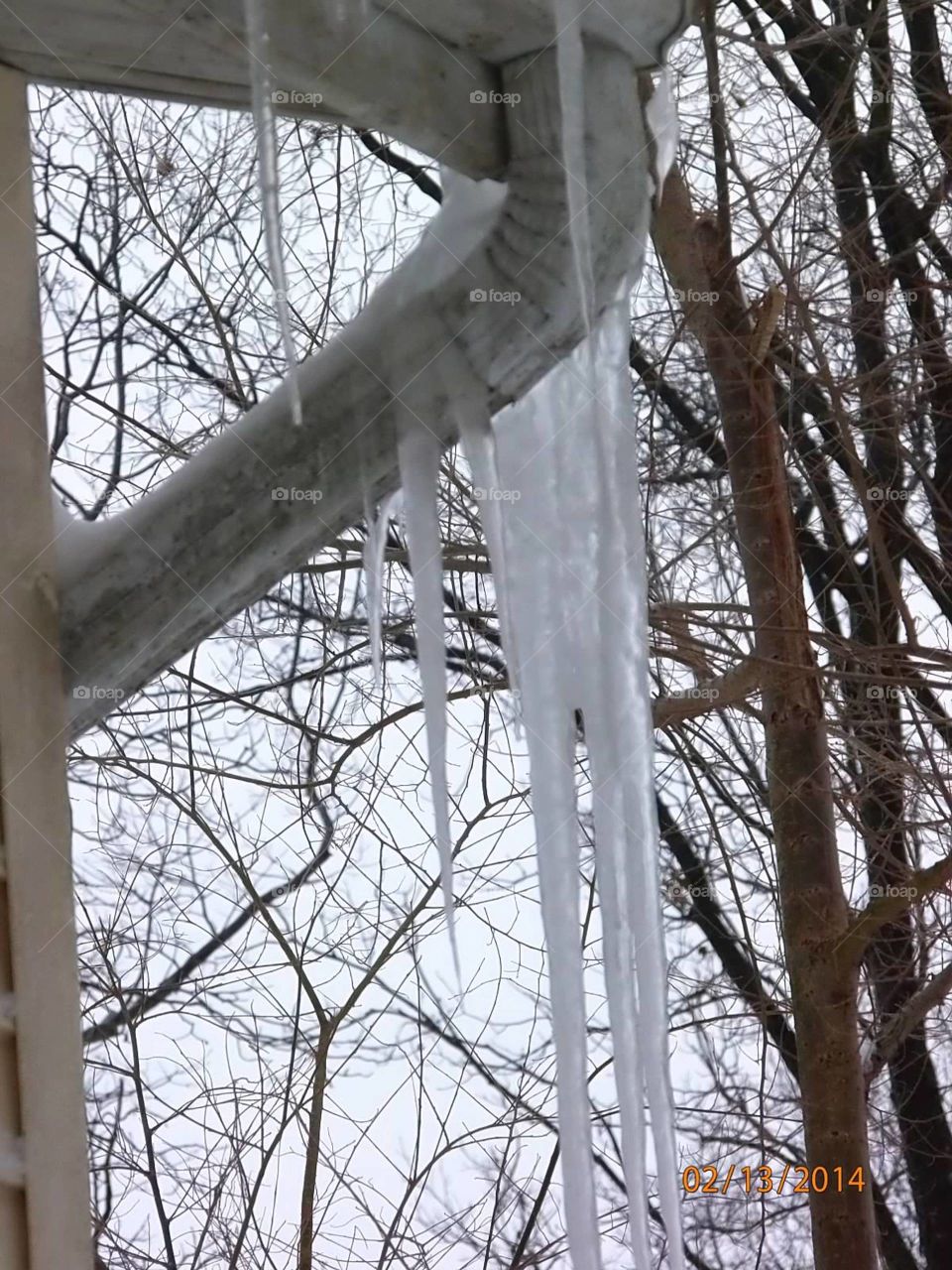 icicle. icicles hanging down from the house