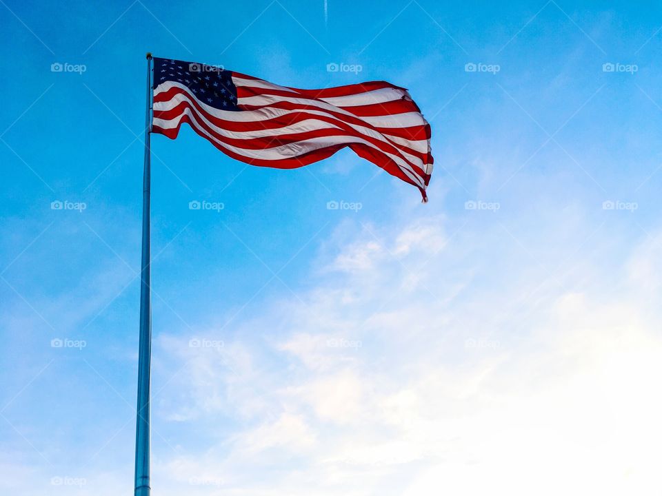 American flag on a tall pole