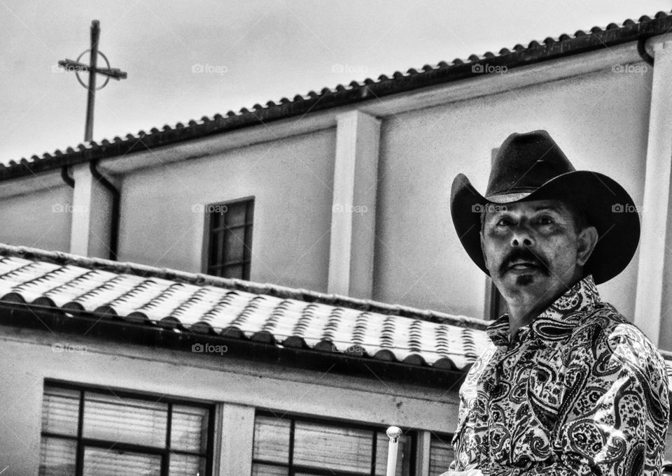 Cowboy With Church In Background