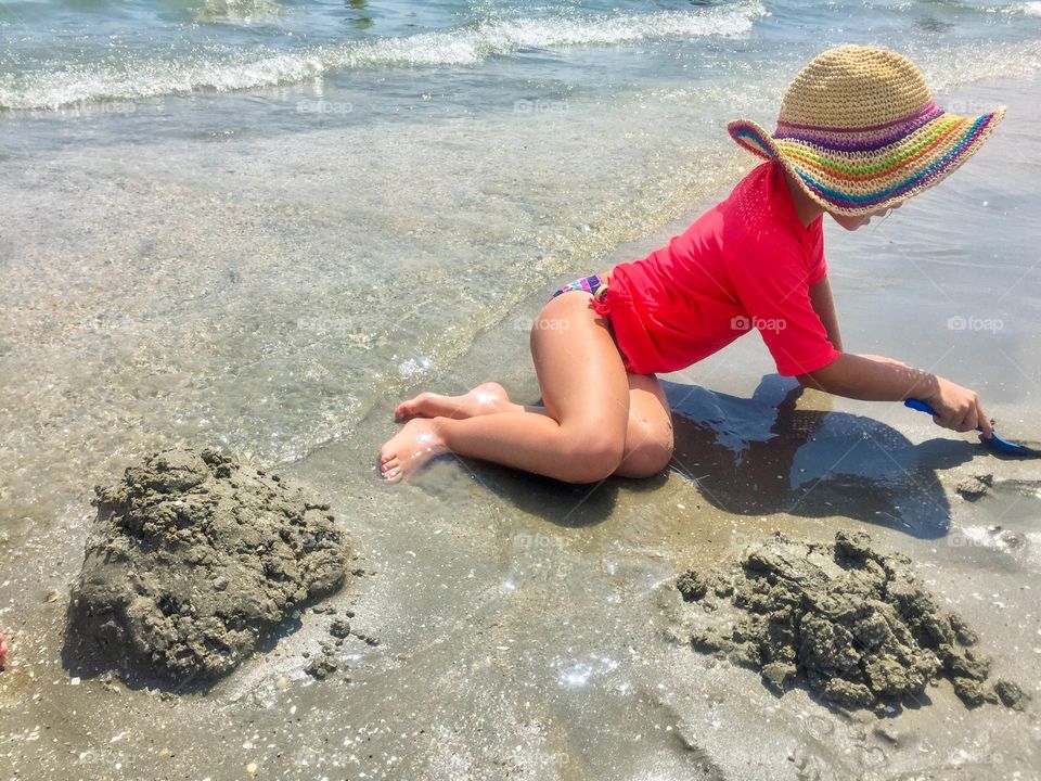 Kids playing in the sand