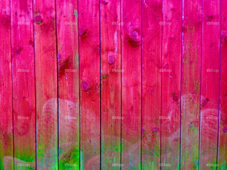 Pink and green wooden door