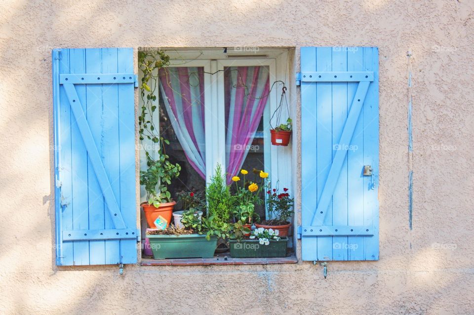 Blue window. Window in Aix en Provence, France 