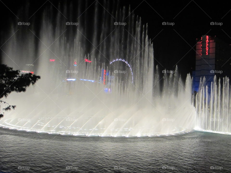 Las Vegas, Bellagio Water Fountains, Light Show. Night View of Casinos on The Strip.