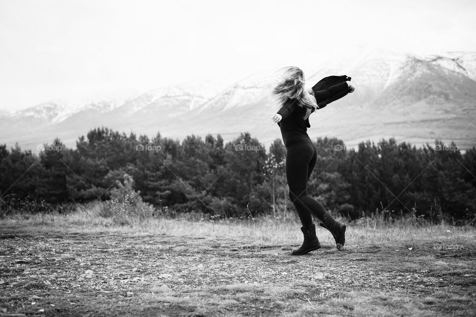 girl dancing on the mountain