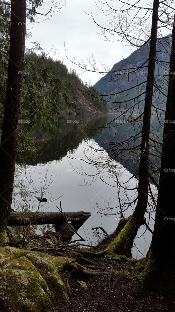 Reflection of mountain on idyllic lake