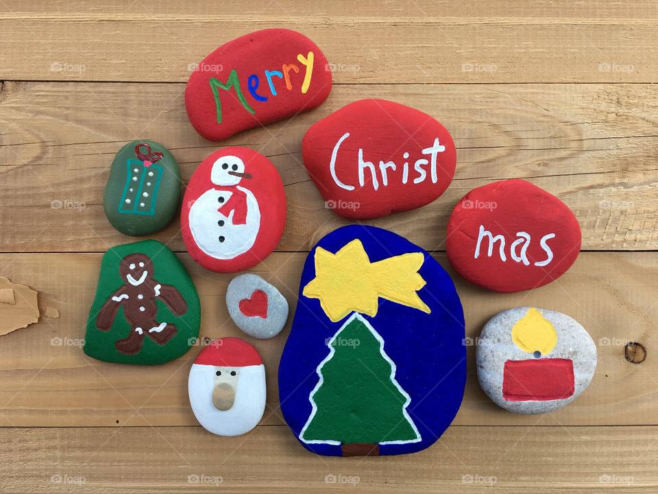 Christmas symbols on colored stones