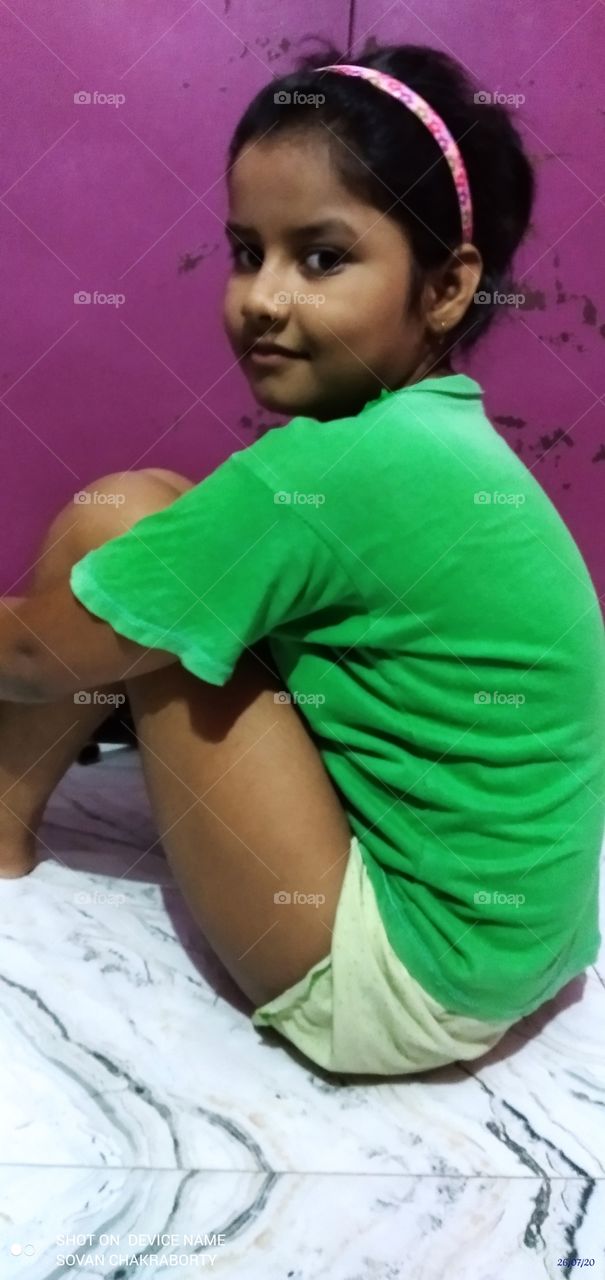 new model girl kolkata bengali beautiful view business photography close-up businesses looking at camera sit on the floor colourful lovely dress green natural pink excellent example background wallpaper