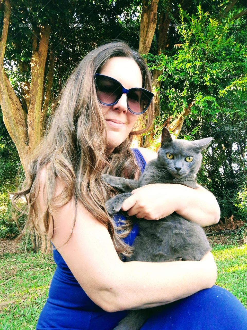 beaultiful cat with his owner