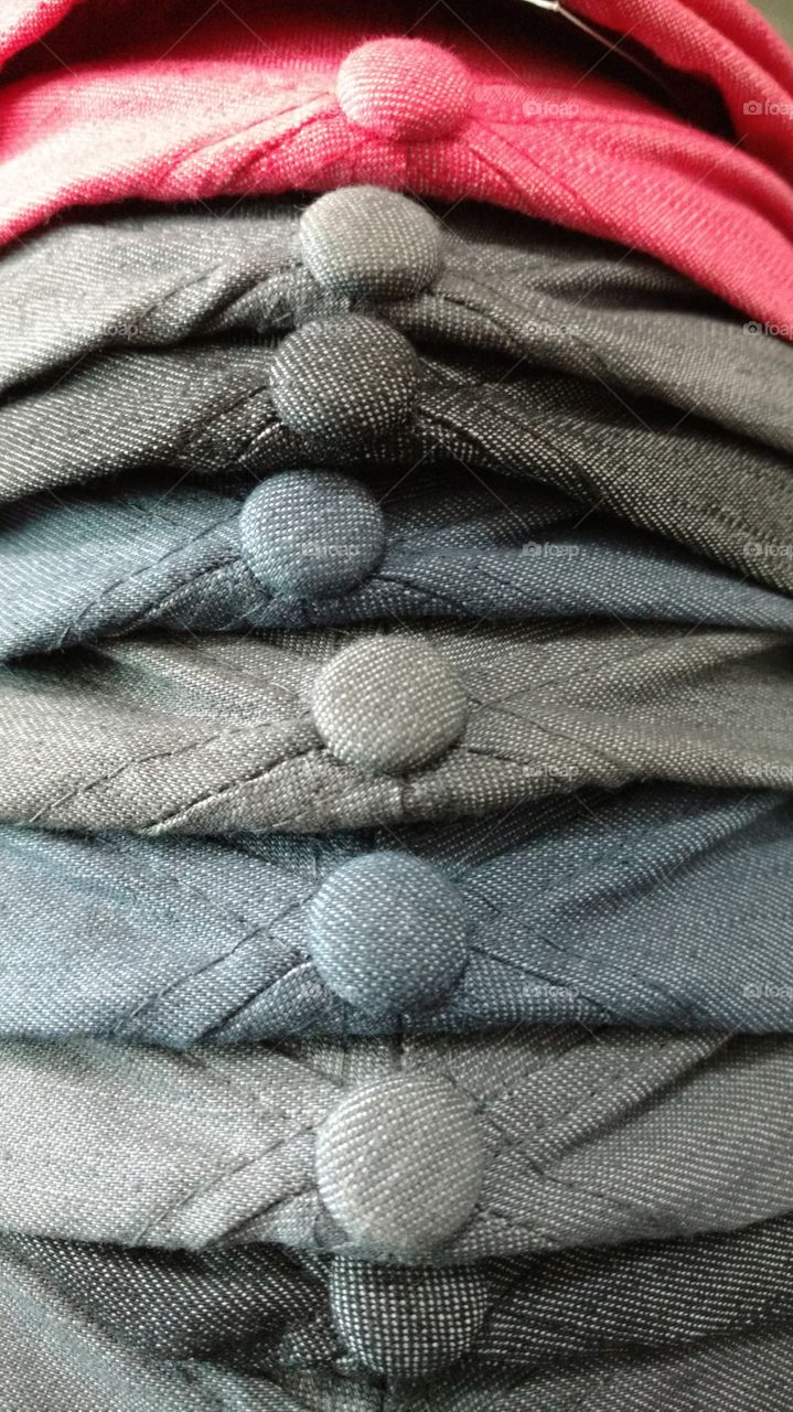 Stack of caps for sale