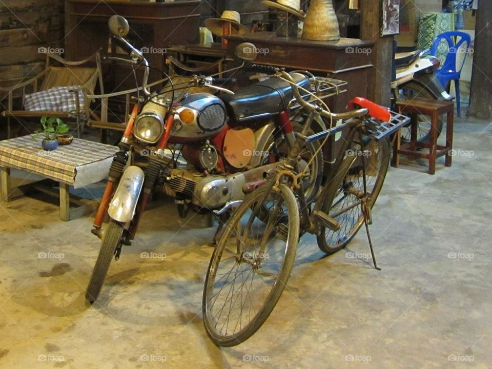 old motorcycle vs old bicycle
