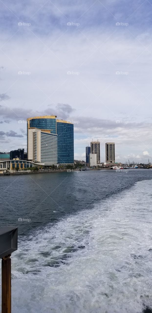 Trinidad and tobago's capital city.... Port-of-Spain. Taken from the ferry that connect the two islands that form one Nation.