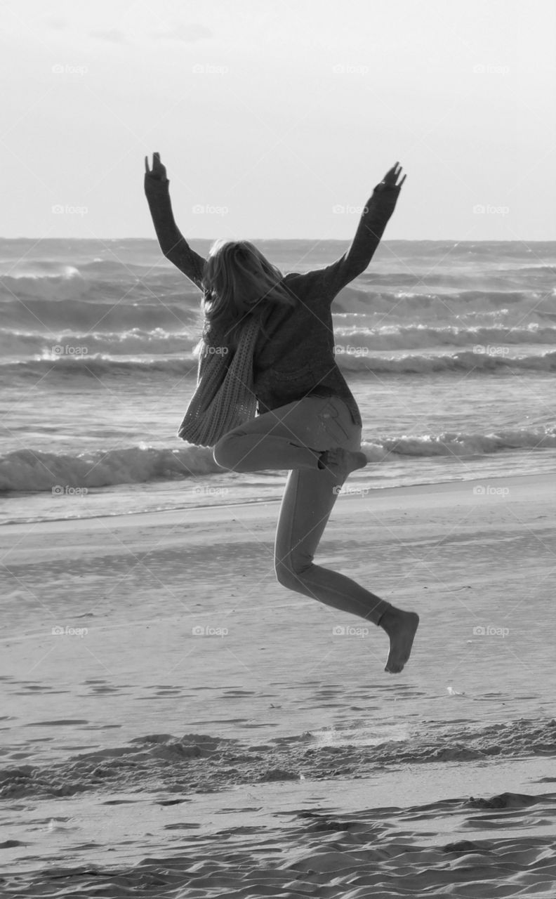 Jumping for joy on the sandy beach by the Gulf of Mexico!
A family from New England enjoying the warm breeze and sandy beach!