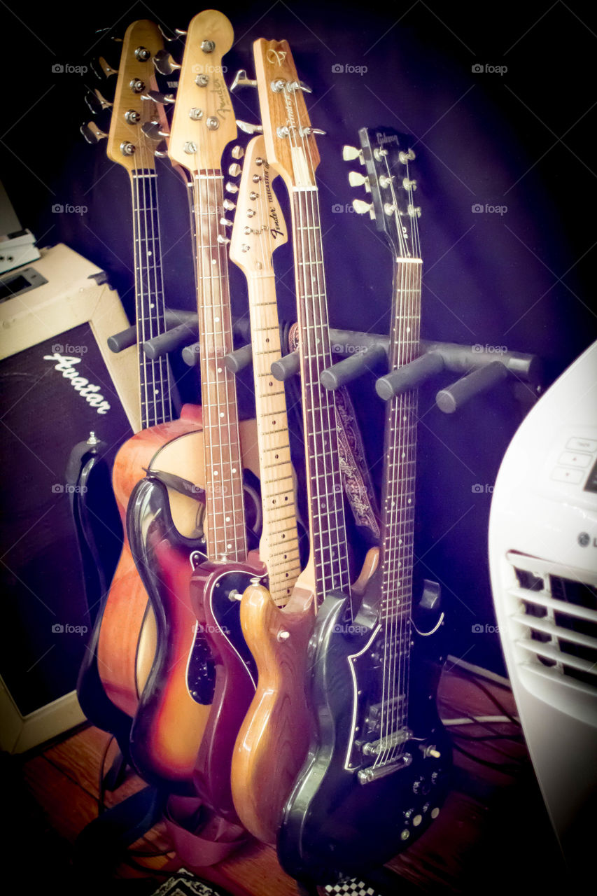 A rack of guitars. 