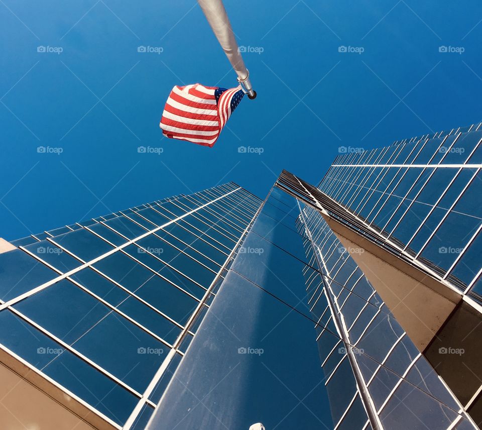 American flag with beautiful architecture 