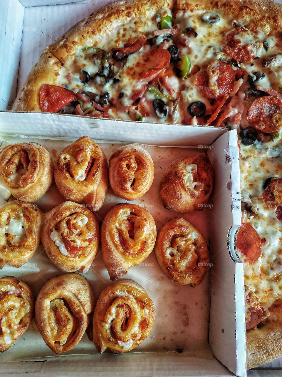 Pizza and rolls.