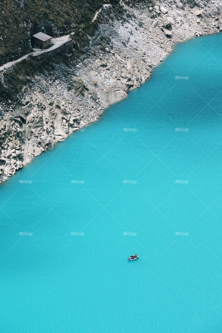 Rowing boat in turquoise waters