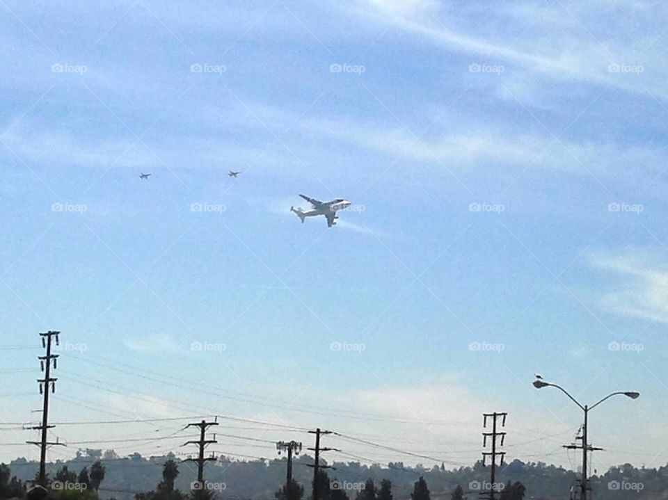 Space Shuttle Flying Back to Earth via Piggyback an Airliner