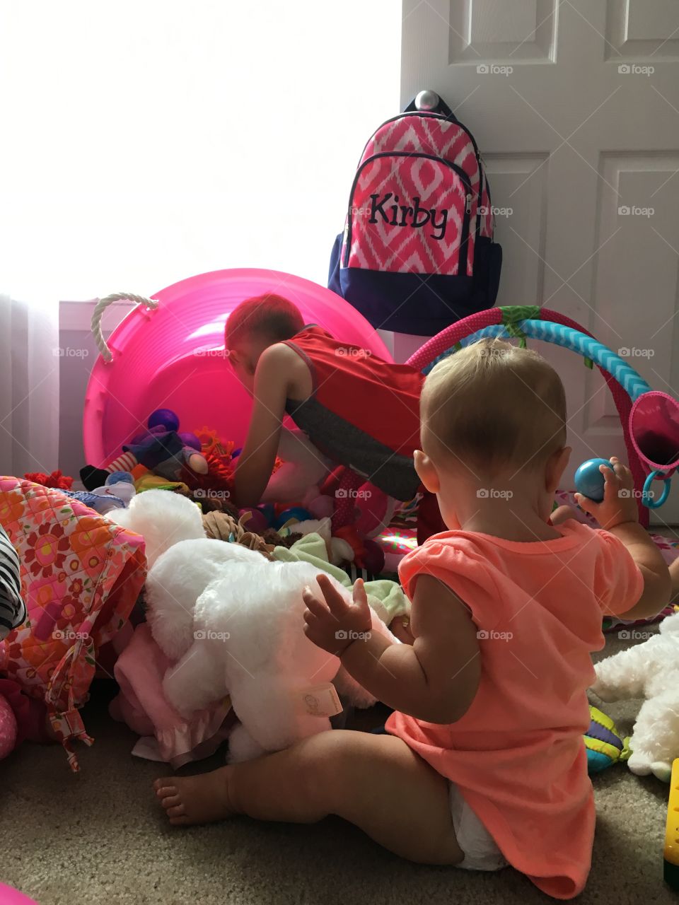 Love is when your brother dumps out the toy box because you can't reach inside 