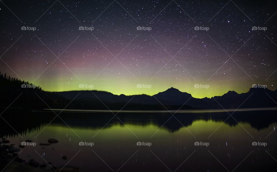 The Northern Lights over Lake McDonald in Glacier, MT. It’s very rare that the Aurora Borealis make an appearance this far south, so experiencing this was an absolute treat an experience that will be cherished for the rest of my life. 