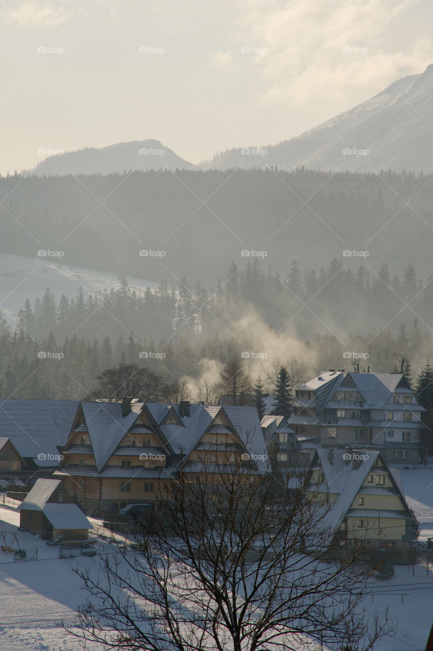 House and winter landscape