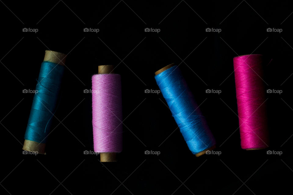 Blue and pink thread
