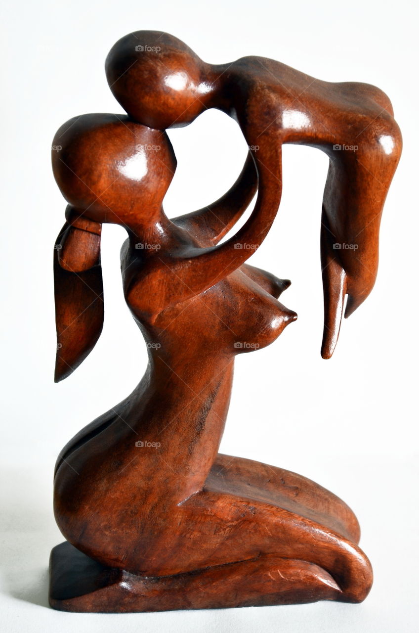 wooden sculpture, woman with child