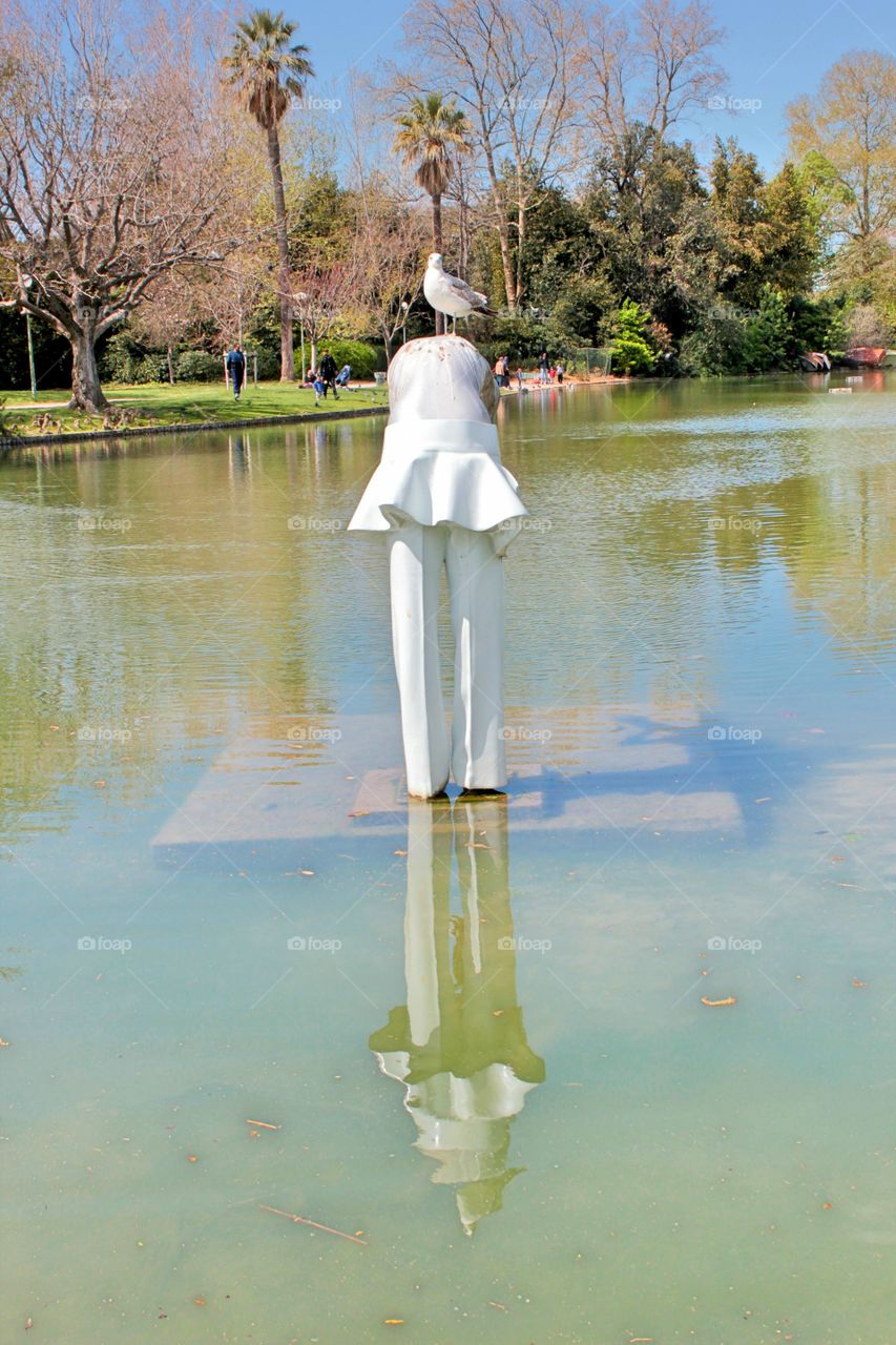statue in a lake