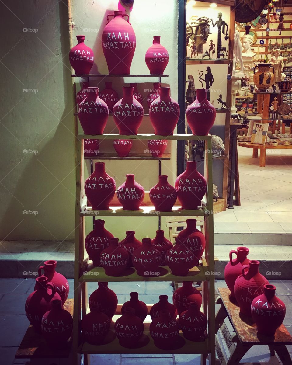 Red clay pots ready for Greek Easter celebrations, Corfu Town, Greece