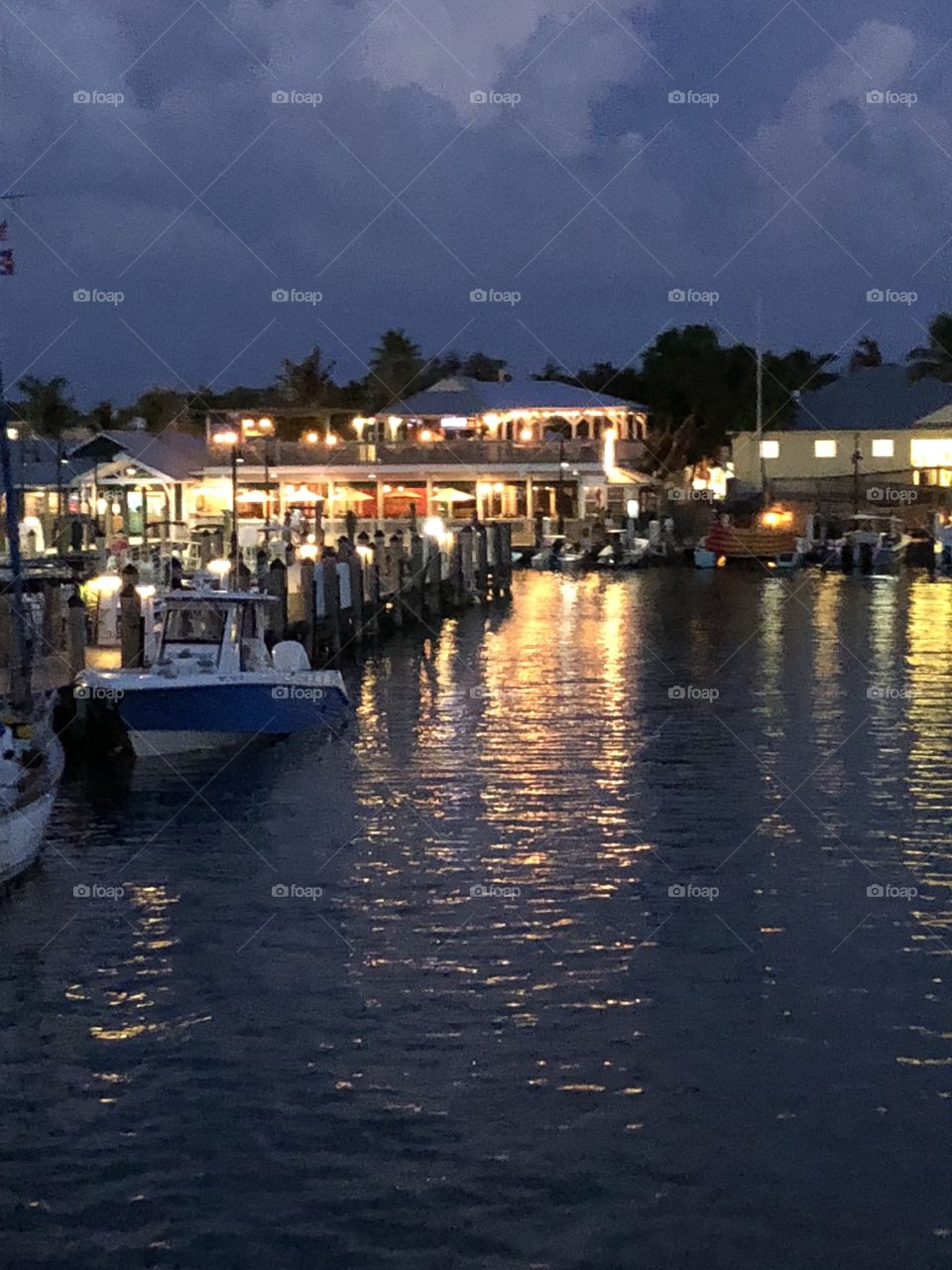 An illuminated night time view of the Turtle Kraals in Key West, Florida. 