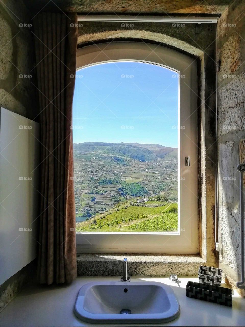 View of the Douro vineyards, from the bathroom window of the Douro Scala Hotel