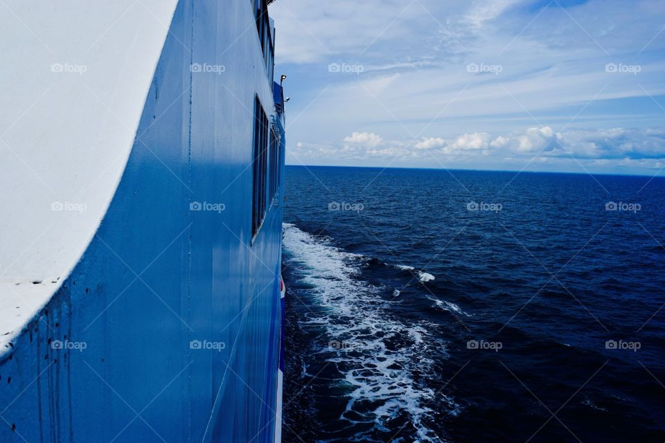 Sideview of a boat heading to Sweden