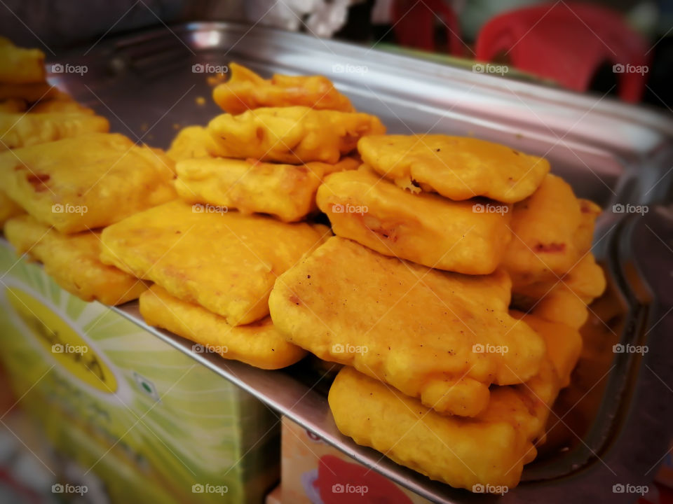Bread pakora is an Indian fried snack. It is also known as bread bhaji. A common street food, it is made from bread slices, gram flour, and spices among other ingredients.serve with tea and chutney.