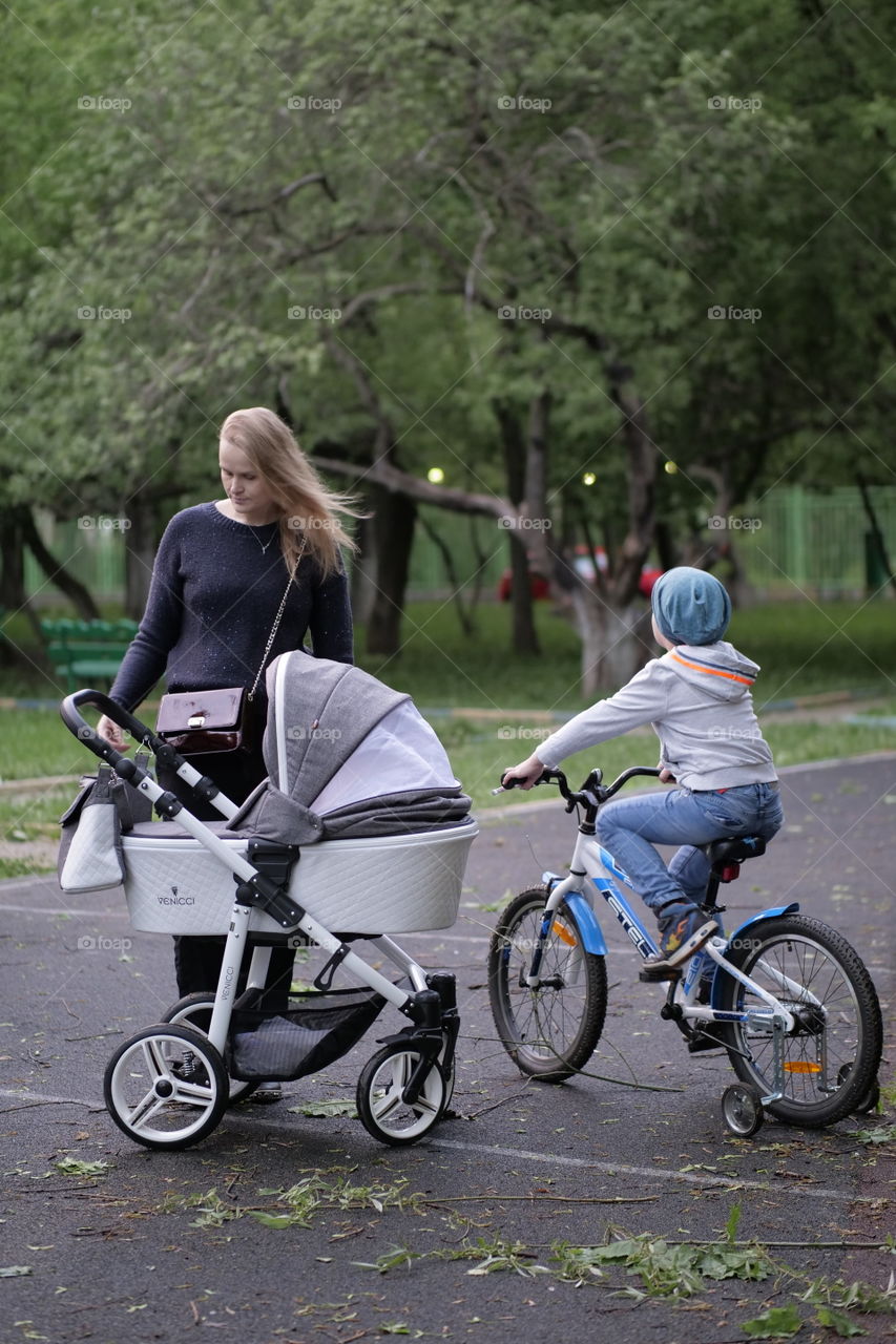 mother on a walk with children