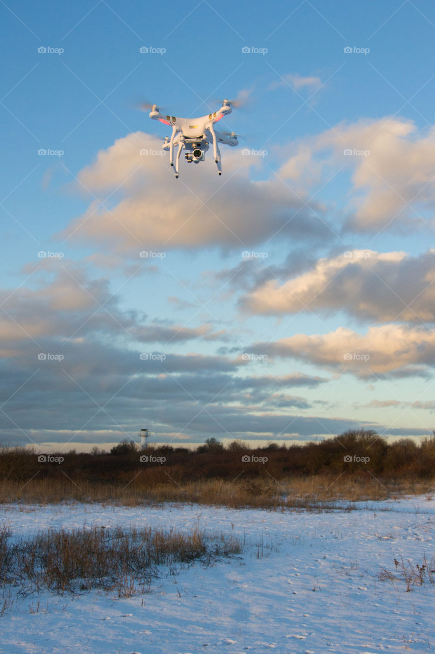 Phantom drone in the air taking pictures.