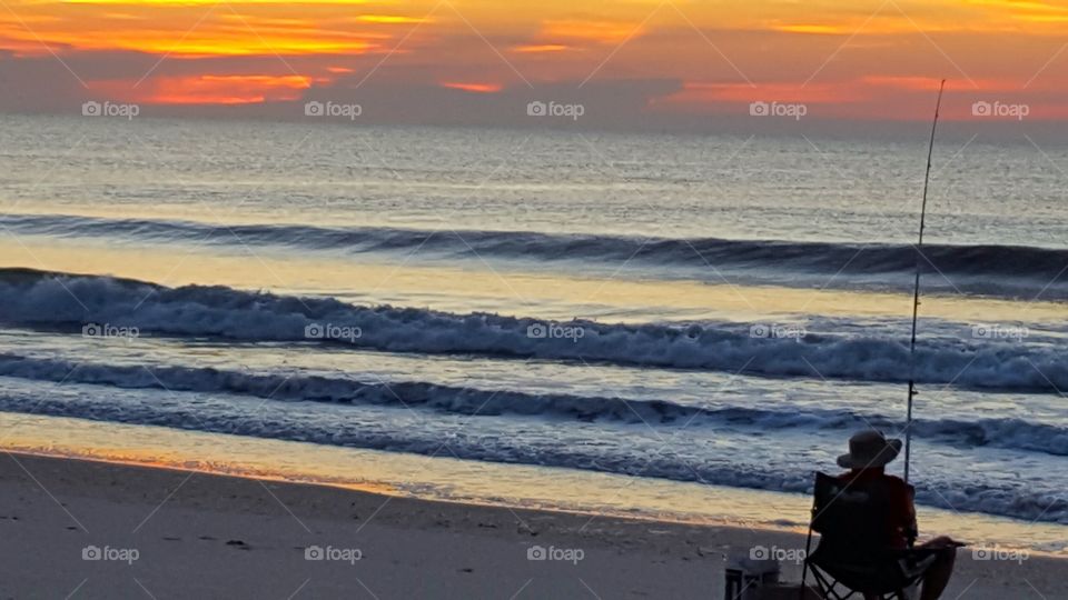 shore fishing at dawn