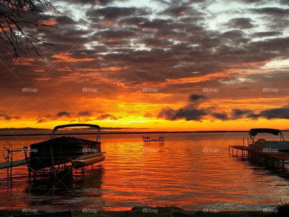 A burning sunrise on Houghton Lake in Northern Michigan. 