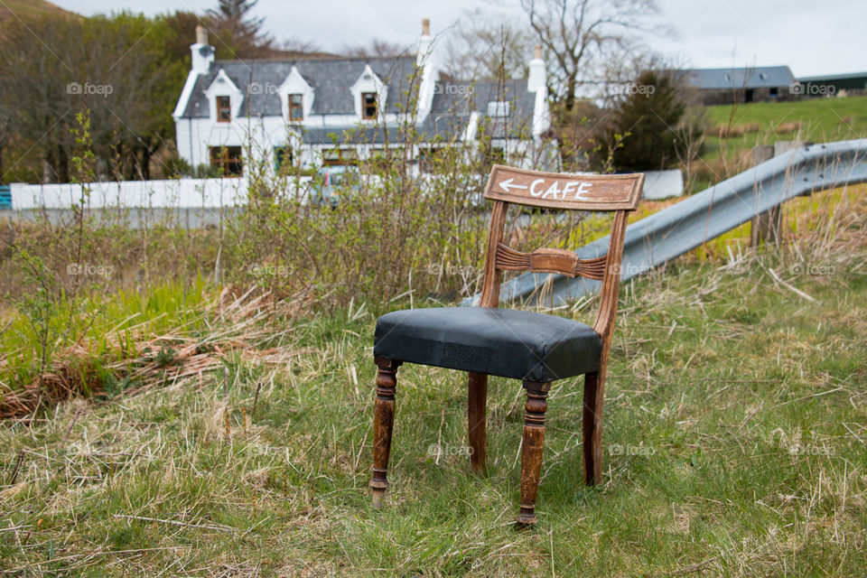 Wooden chair on the grassy land
