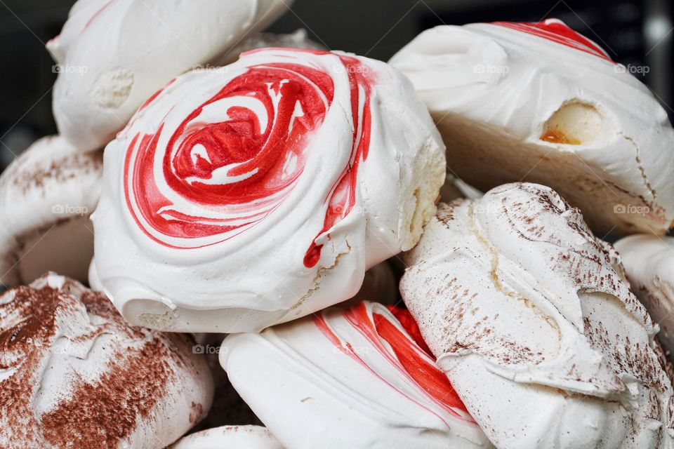 Raspberry ripple and chocolate meringues.