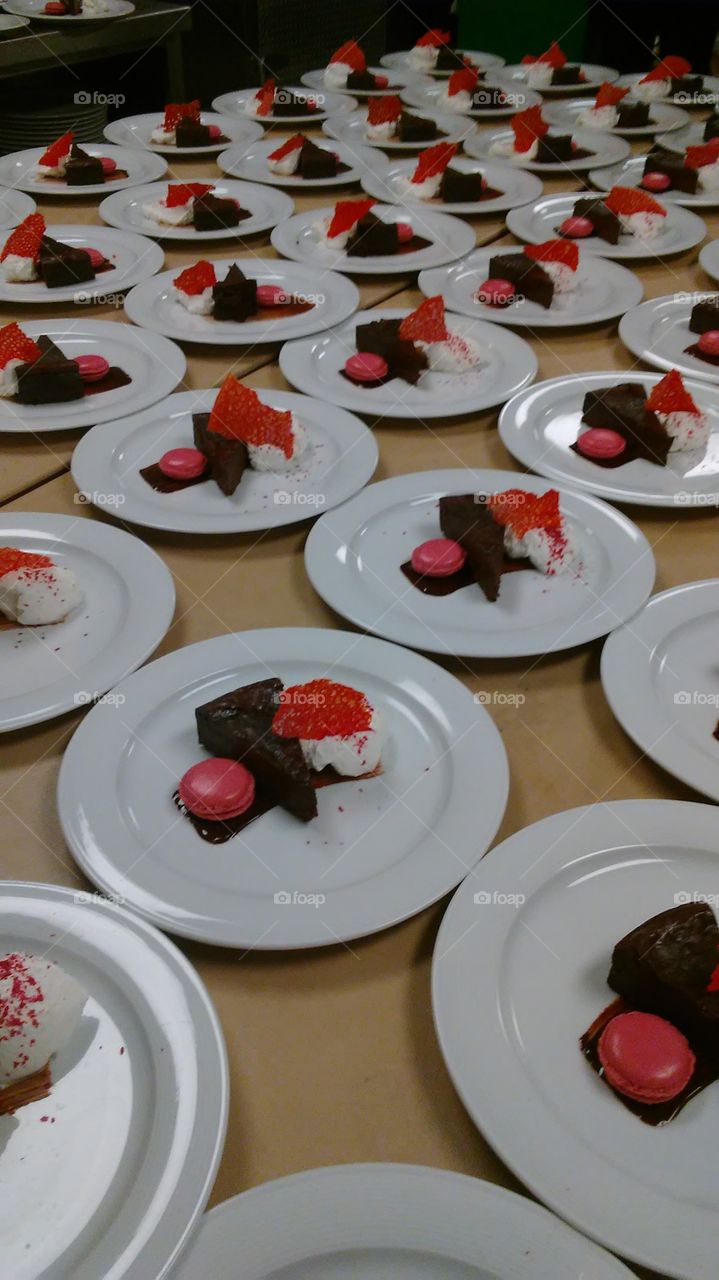 chocolate torte with raspberry macaroon, fried tuile and whipped cream