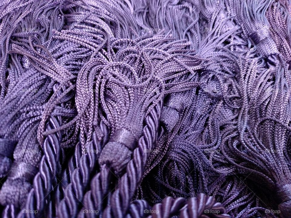 Full frame of purple tassels