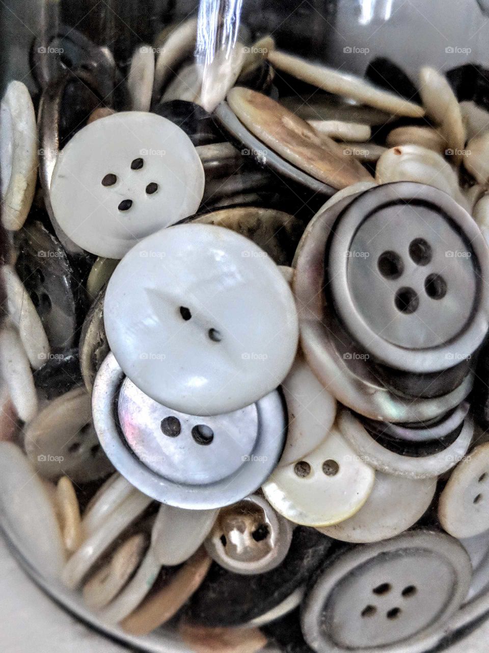 jar of buttons close up