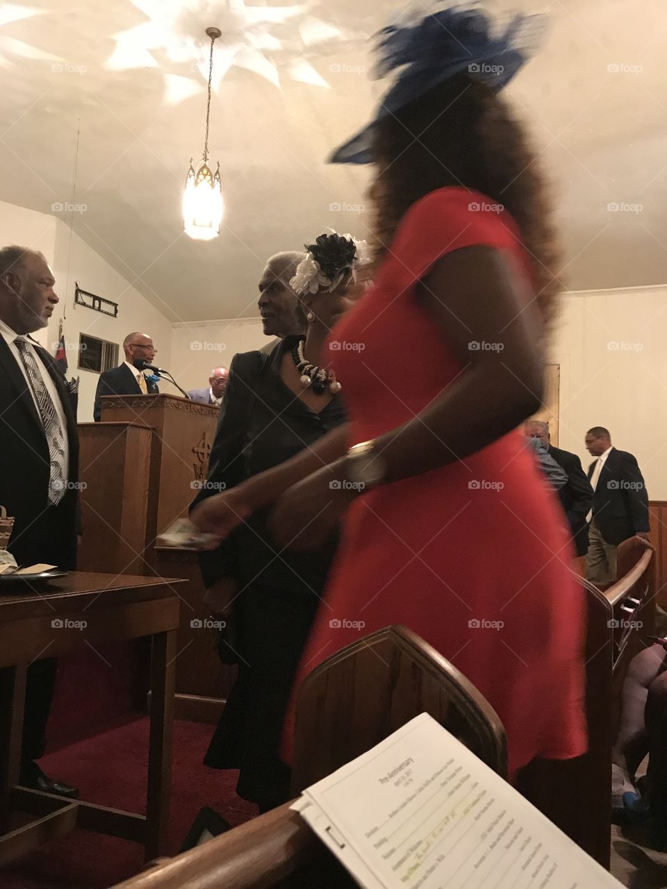 Church service, praising, lady in red
