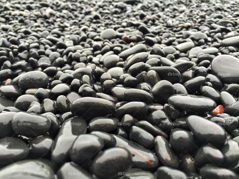 Directly above shot of pebbles on beach