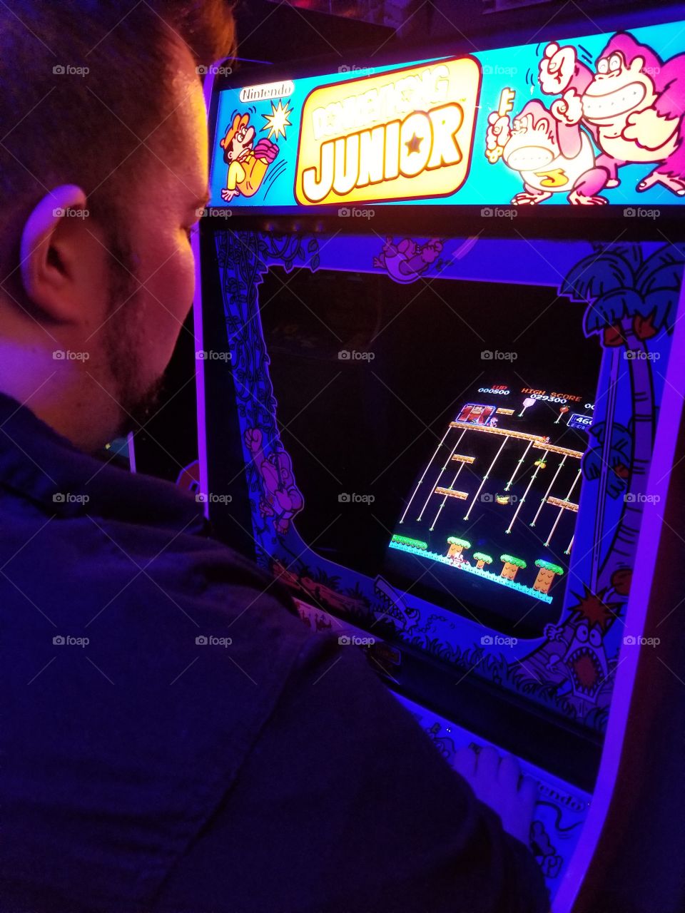 playing classic games at arcade bar