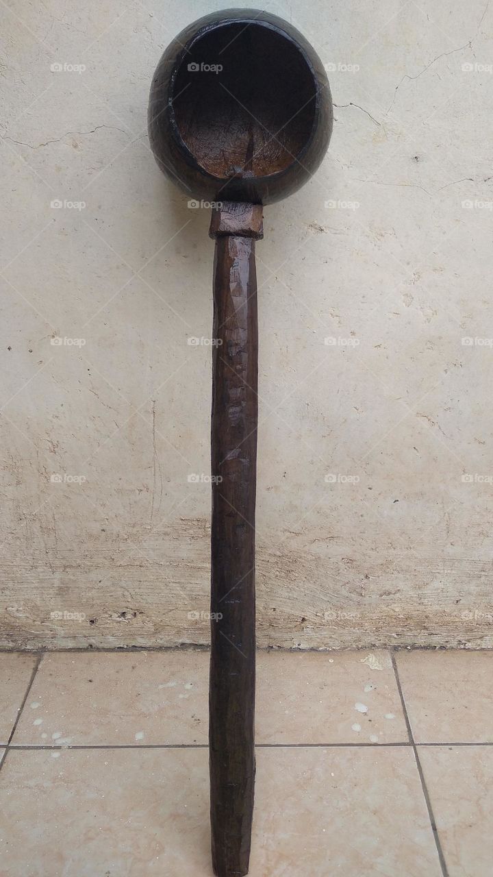 The ancient dipper is made of coconut skin and wood