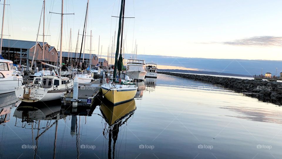 yellow boat at marina