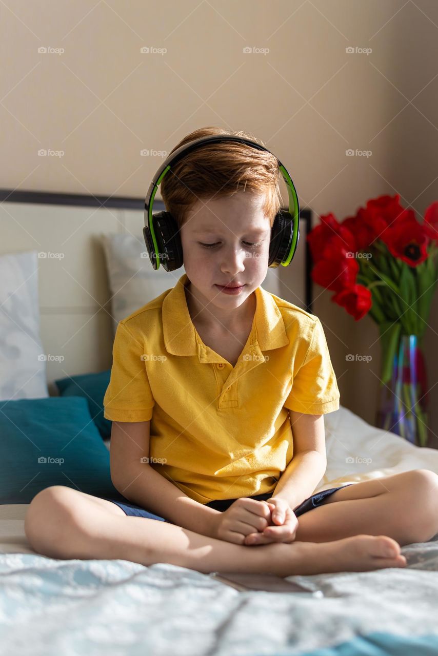 red-haired boy child, bright emotions sadness