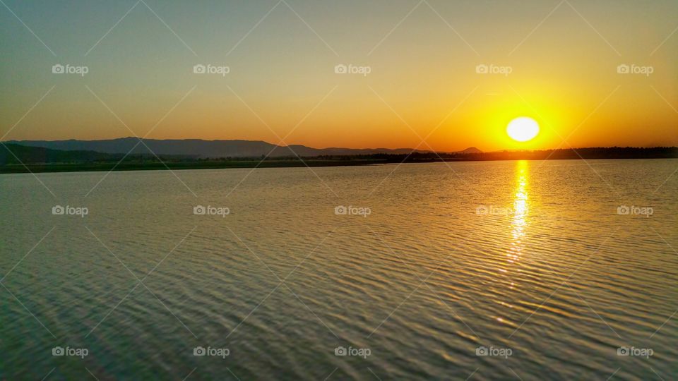 sunset lake water
